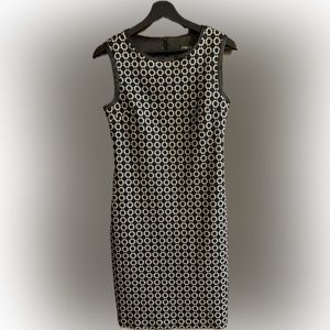NWOT Trisisto Femme black and silver pattern dress. Soft black lining.
